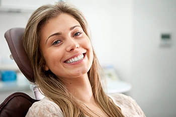 smiling women with Dental Crowns