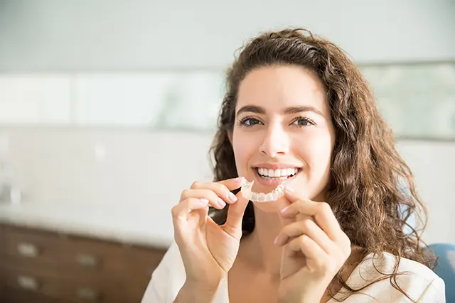 Invisalign attachments are small buttons that help your aligners